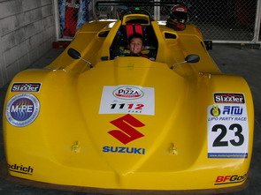 Sandy trying "on" the Aim II Concept car, still needs a few more cm's though...